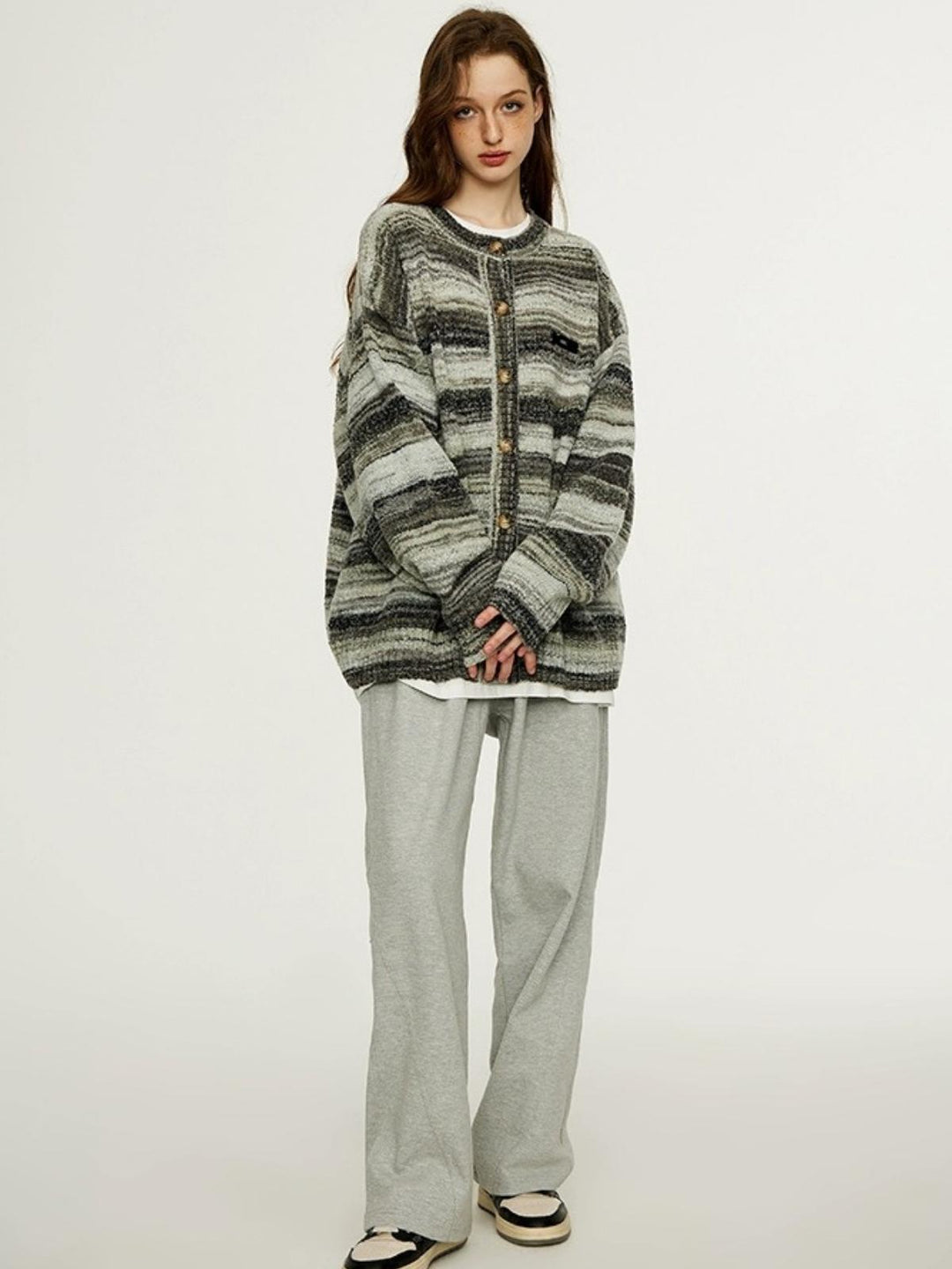 Shena | Women’s striped knit top with round neck and button detail