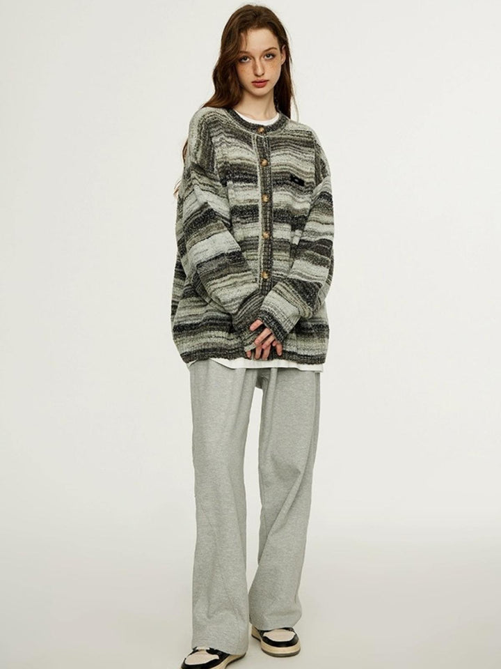 Shena | Women’s striped knit top with round neck and button detail
