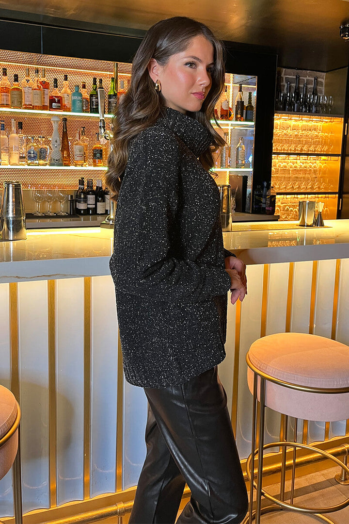 Reign | Women’s metallic roll neck sweater with relaxed fit