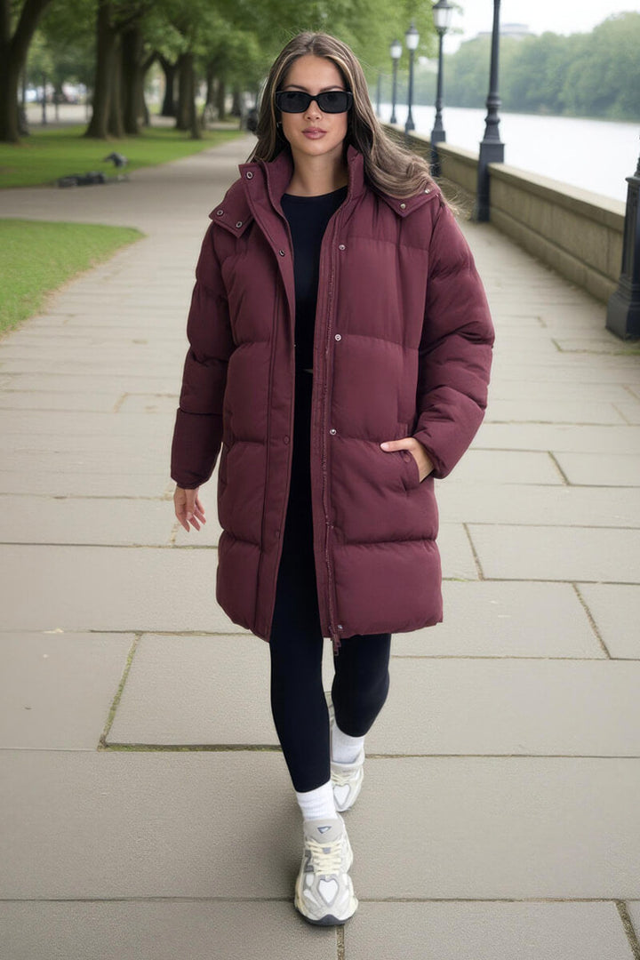 Kennedi | Women’s hooded longline puffer coat with side pockets