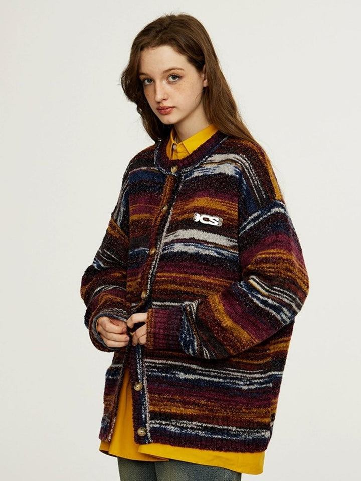 Shena | Women’s striped knit top with round neck and button detail