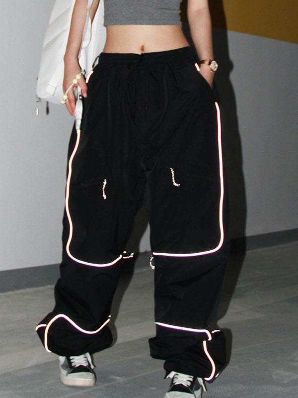 Cadenza | Women’s baggy snow pants with reflective detailing and multi-pocket design