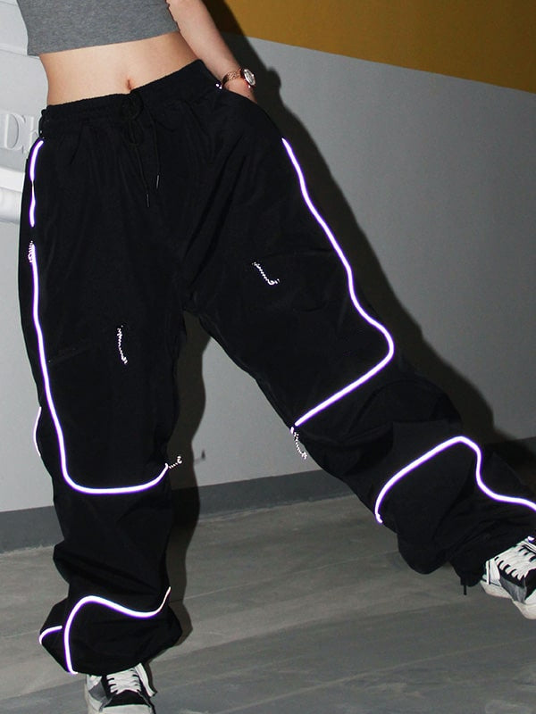 Cadenza | Women’s baggy snow pants with reflective detailing and multi-pocket design