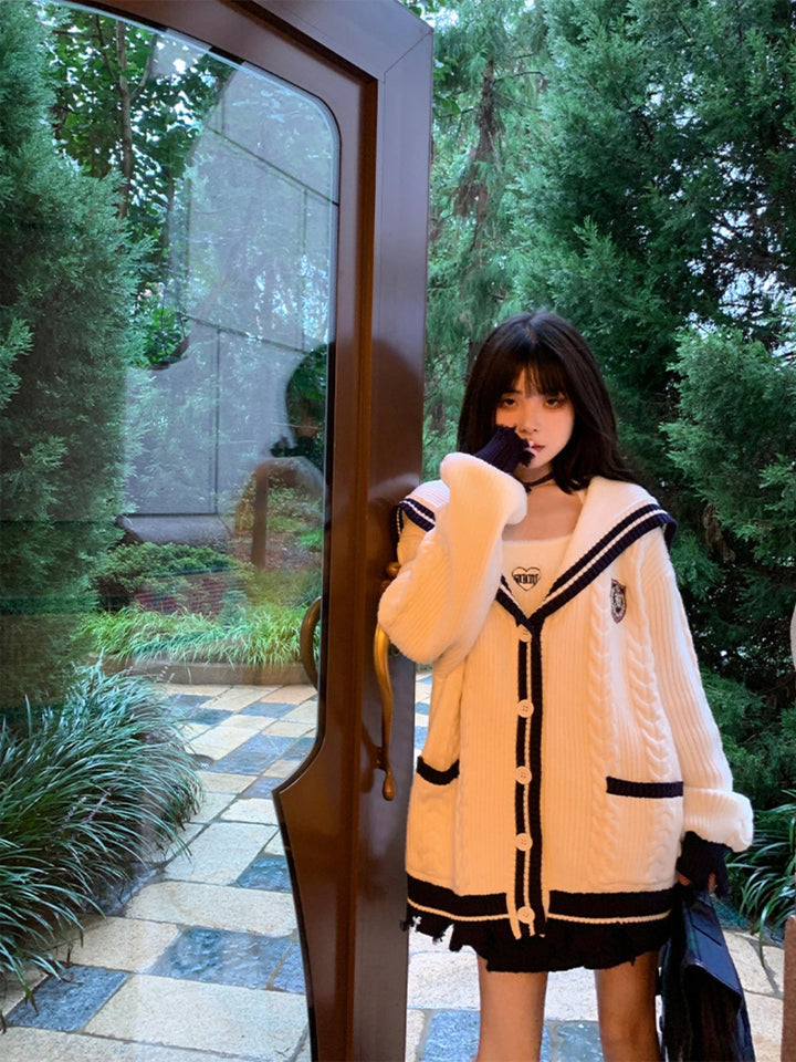 Mille | Women’s long knit cardigan with navy collar and button closure