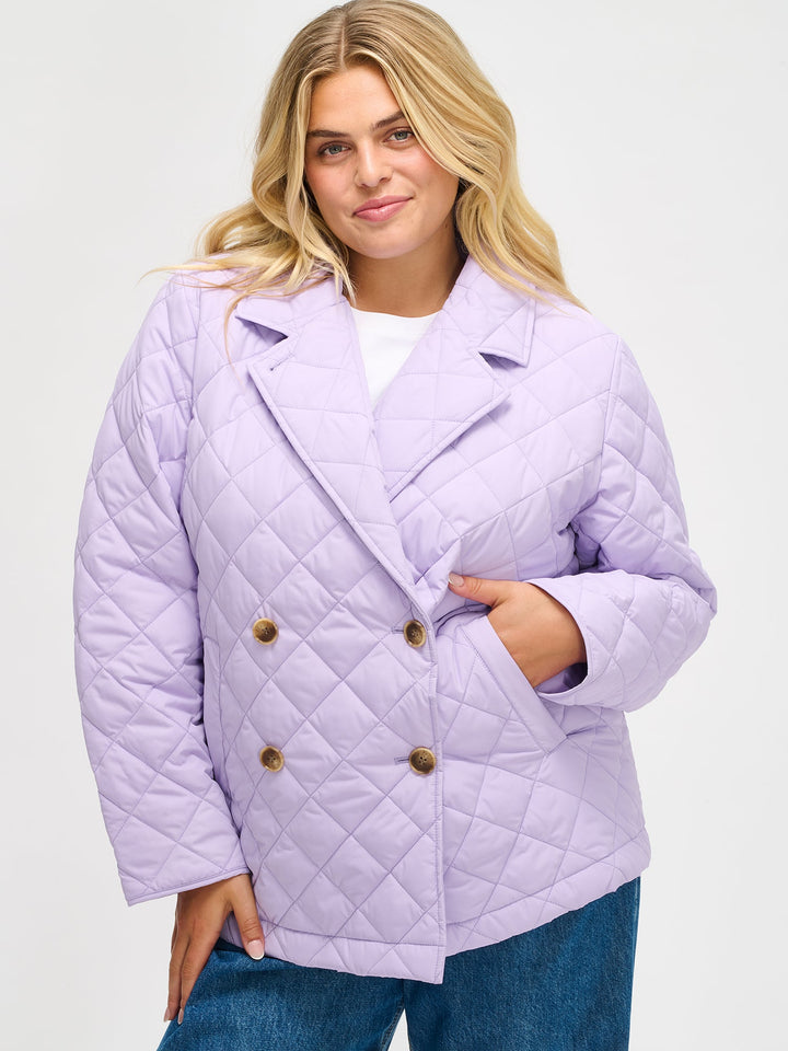 Regina | Women’s double-breasted quilted jacket with wide lapel collar