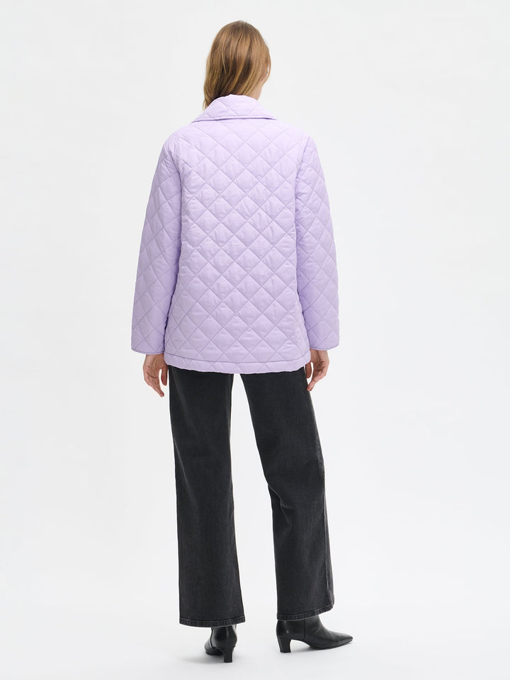 Regina | Women’s double-breasted quilted jacket with wide lapel collar