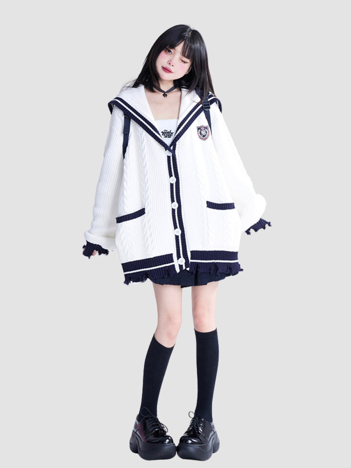 Mille | Women’s long knit cardigan with navy collar and button closure