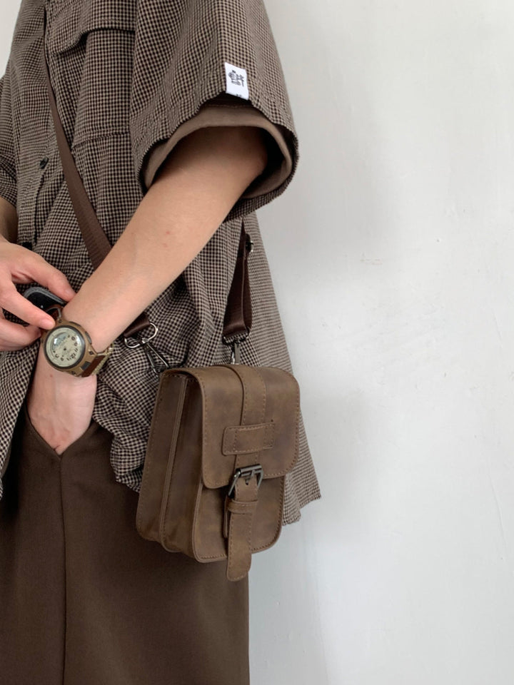 Karina | Women’s crossbody bag with buckle closure and compact design