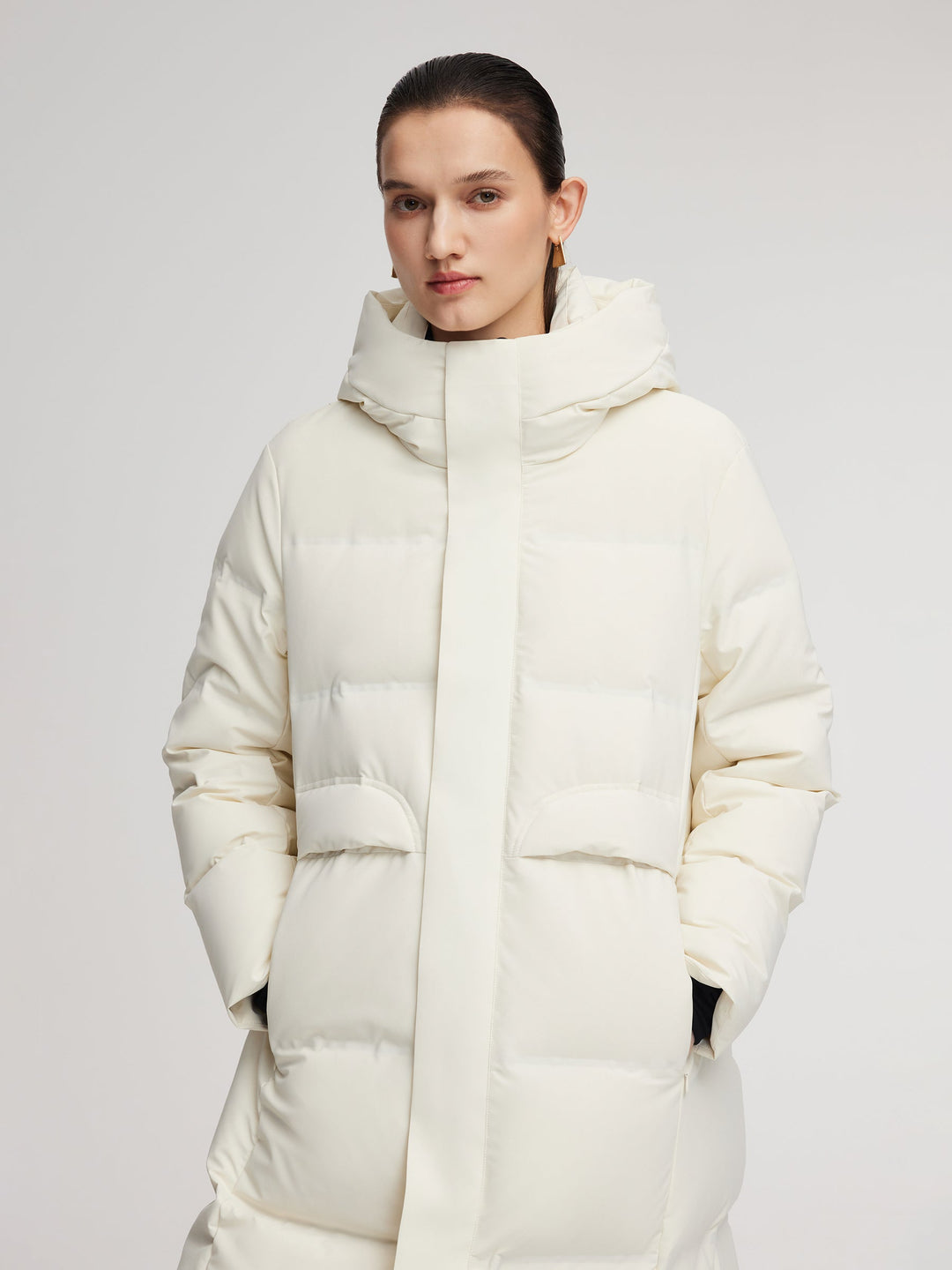 Corvyn | Women’s long hooded winter coat with a streamlined thermal silhouette