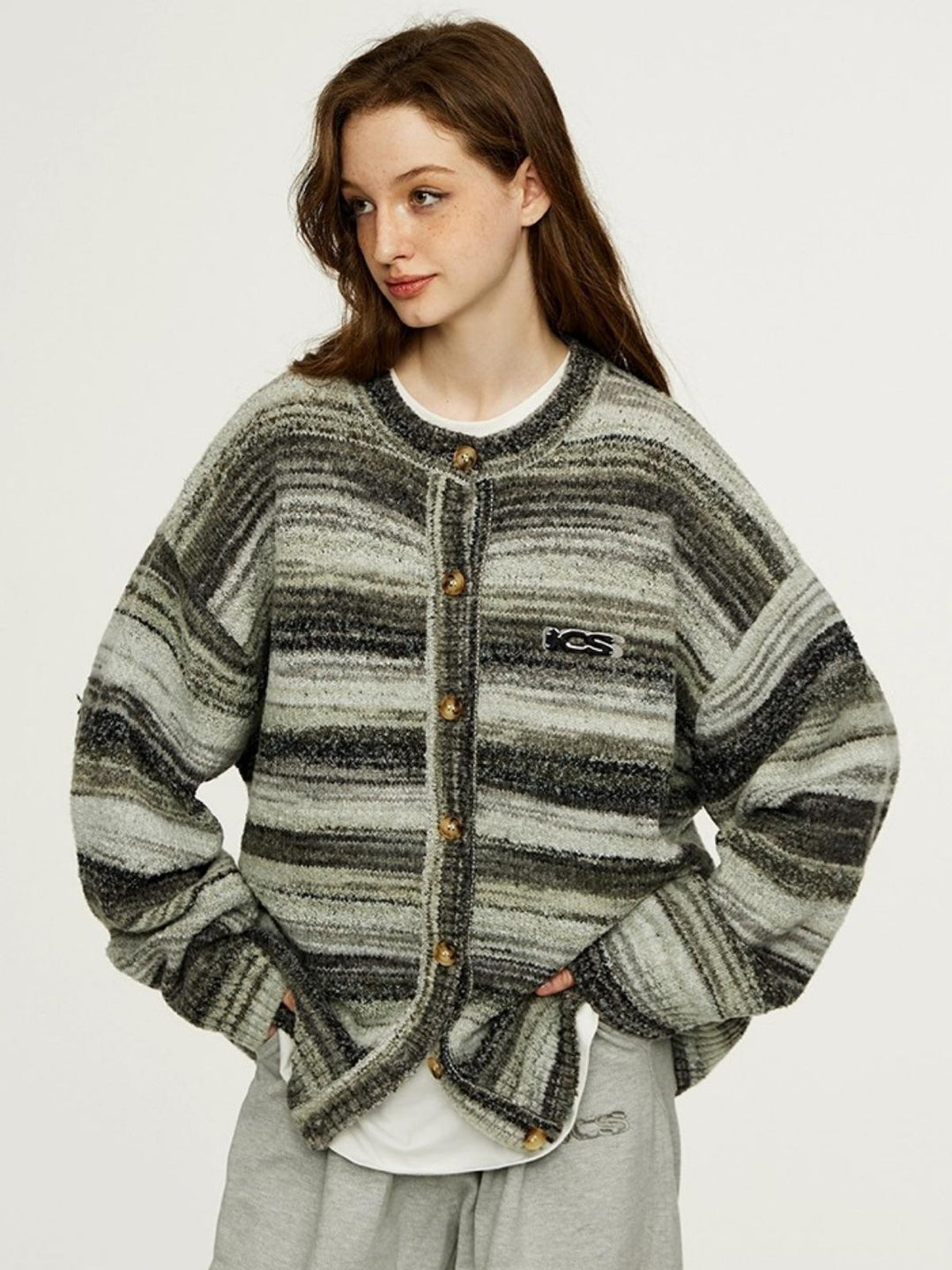 Shena | Women’s striped knit top with round neck and button detail