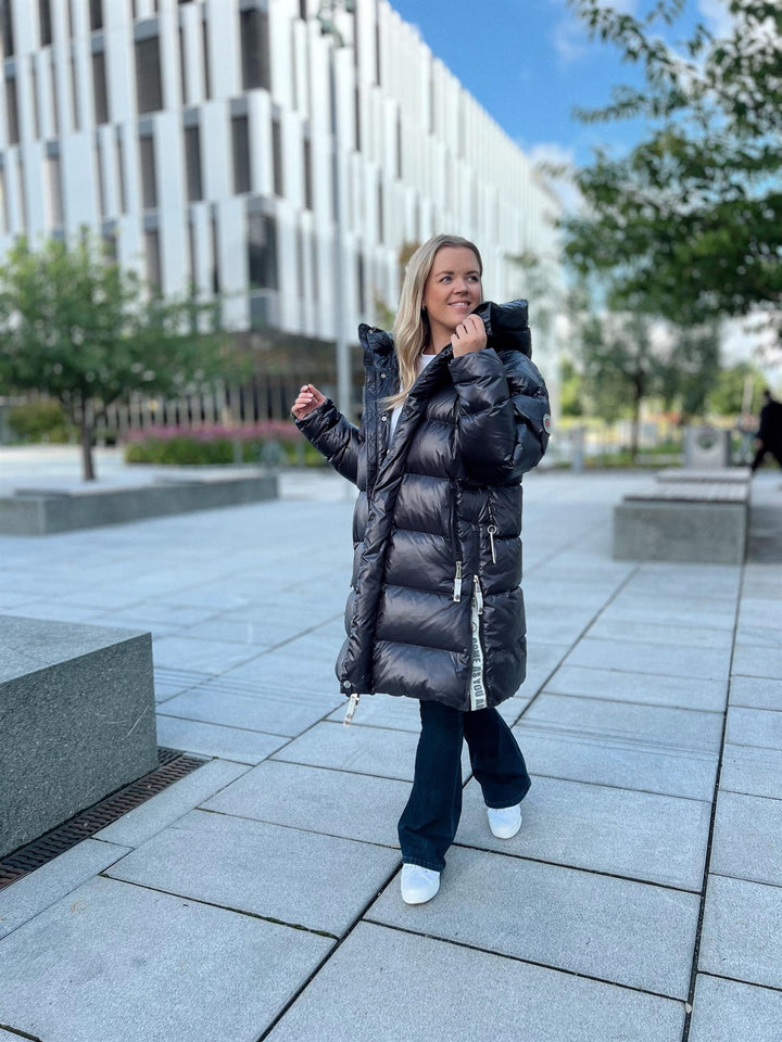 Aliya | Women’s long down puffer coat with hood and side-zip detailing