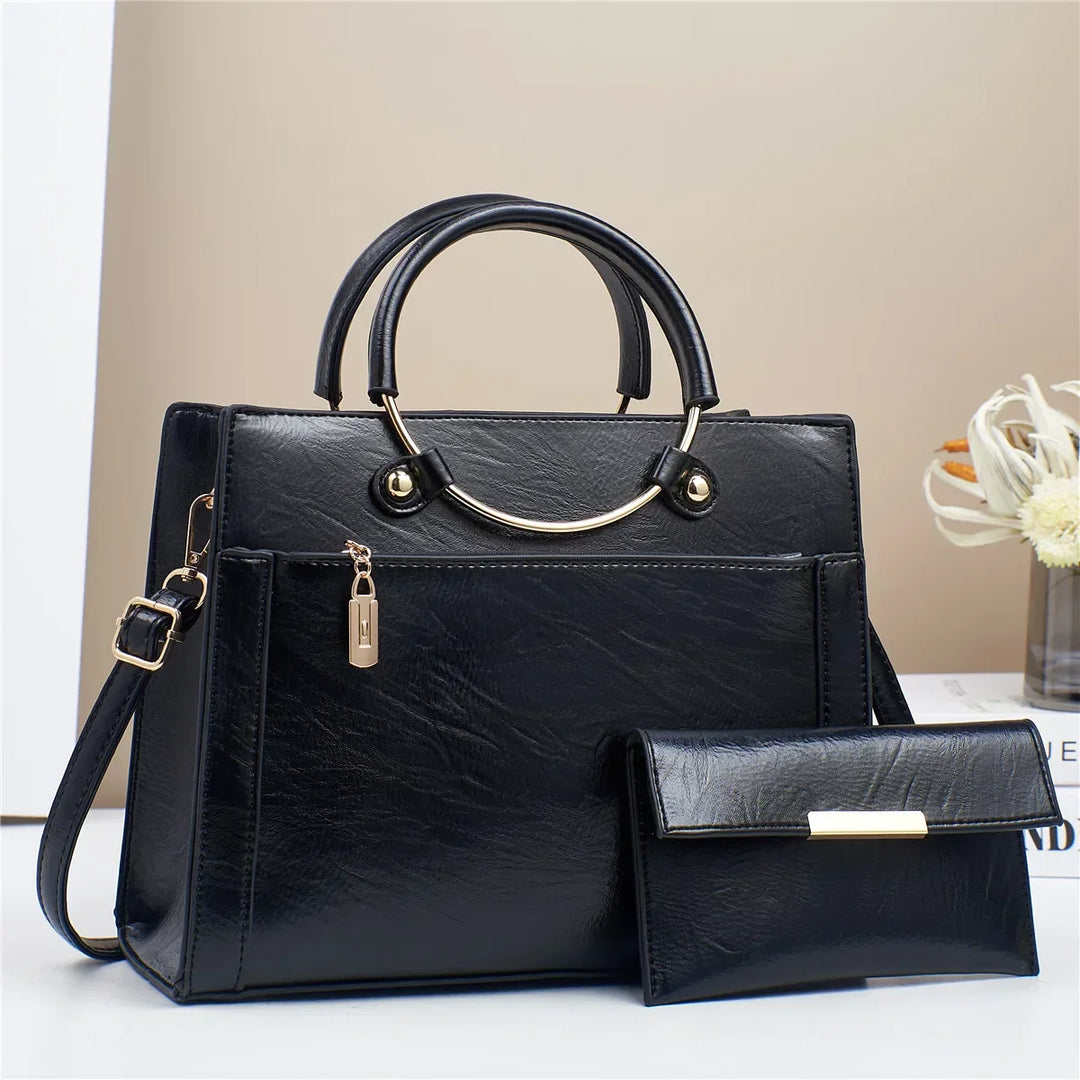Norah | Women’s leather handbag set with gold ring handle and wallet