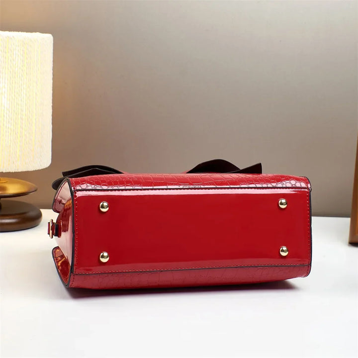 Maddie | Women’s polished leather handbag set with bow detail