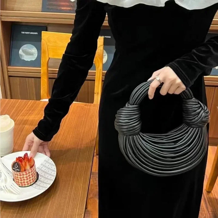 Laureen | Women’s crossbody wrap bag with sculptural design and detachable strap