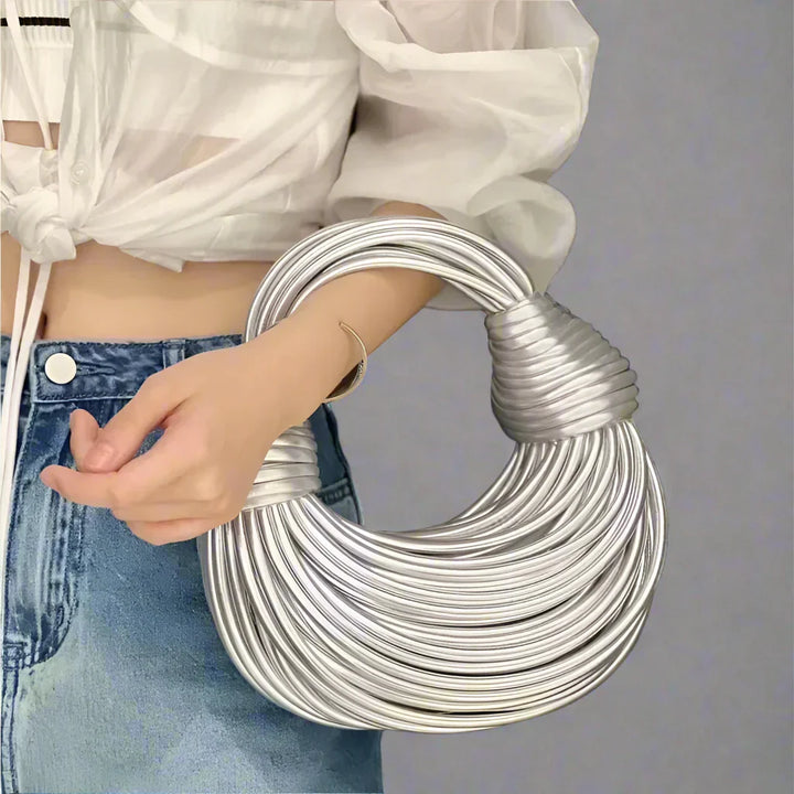 Laureen | Women’s crossbody wrap bag with sculptural design and detachable strap