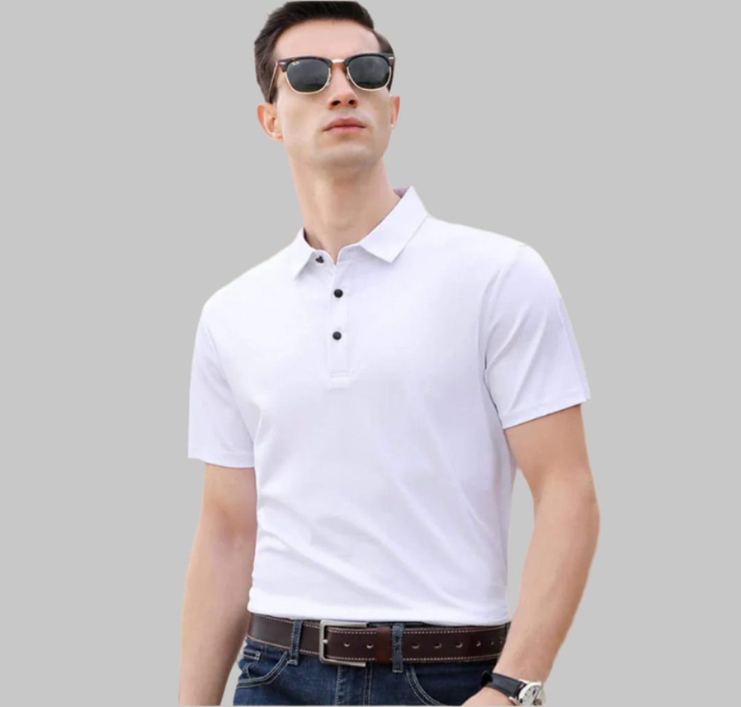 Man wearing a white polo shirt with black buttons on a beige background