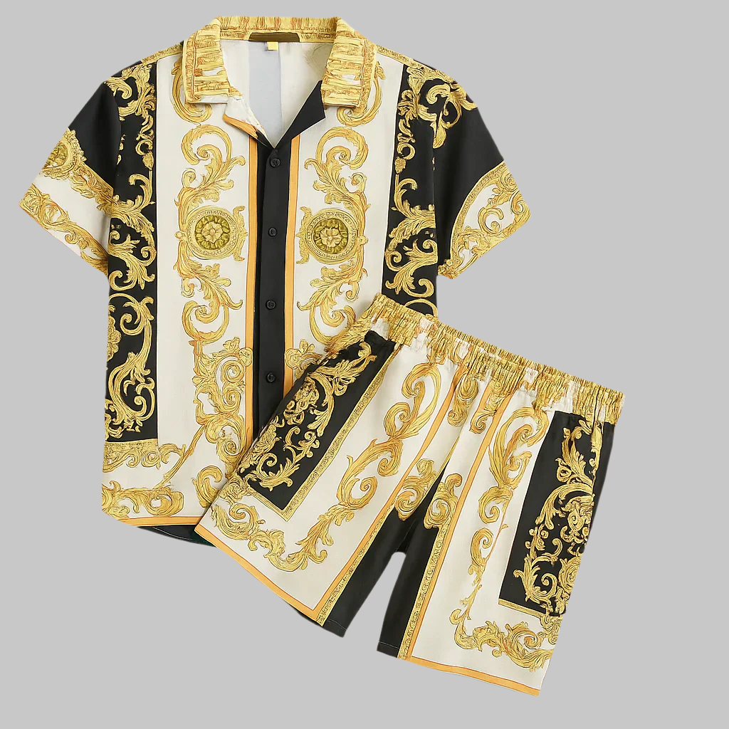 Luxury outfit with ornate gold and black design on a gray background