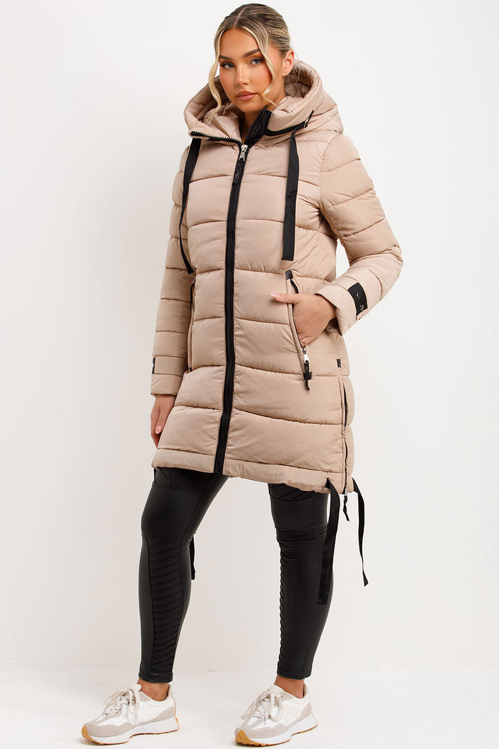 Joelle | Women’s long hooded puffer coat with side strap detail