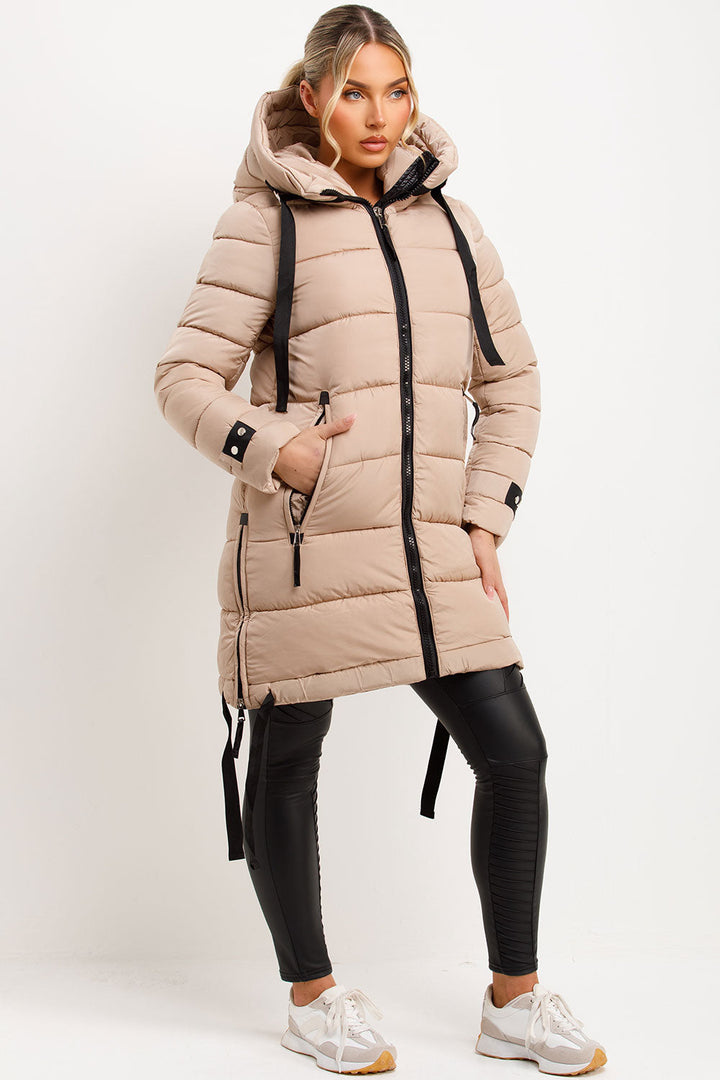 Joelle | Women’s long hooded puffer coat with side strap detail