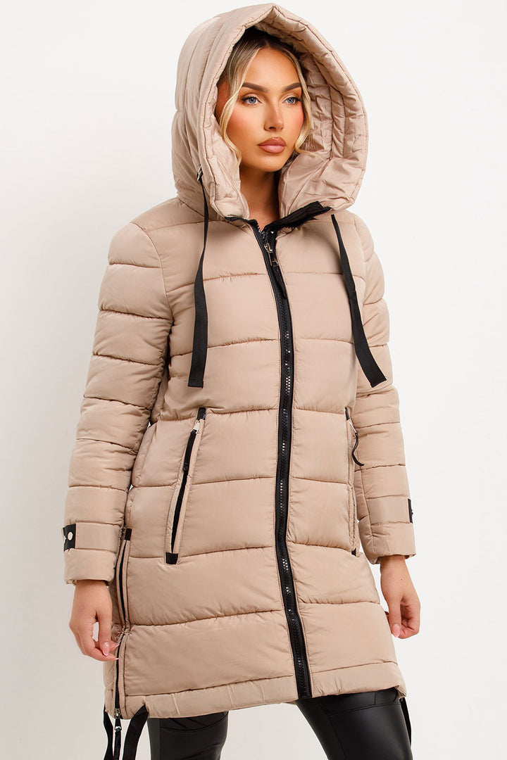 Joelle | Women’s long hooded puffer coat with side strap detail