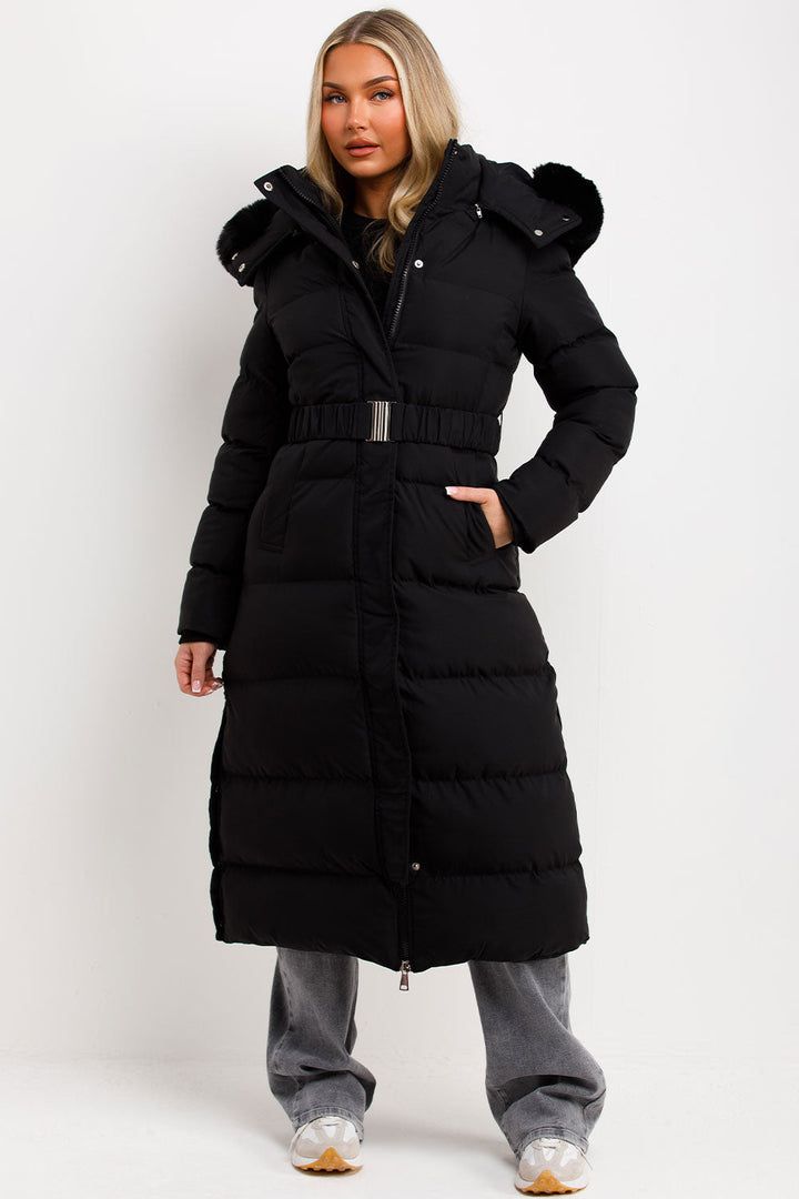 Reeva | Women’s long puffer coat with faux fur hood and belt