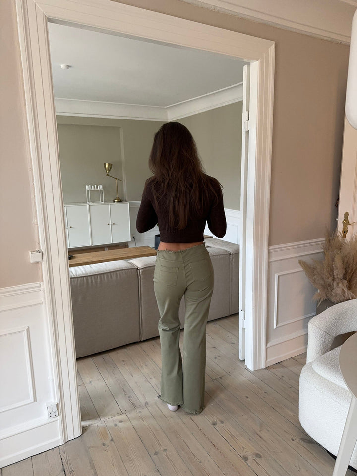 Zola | Women’s jeans with fringe details and flared silhouette