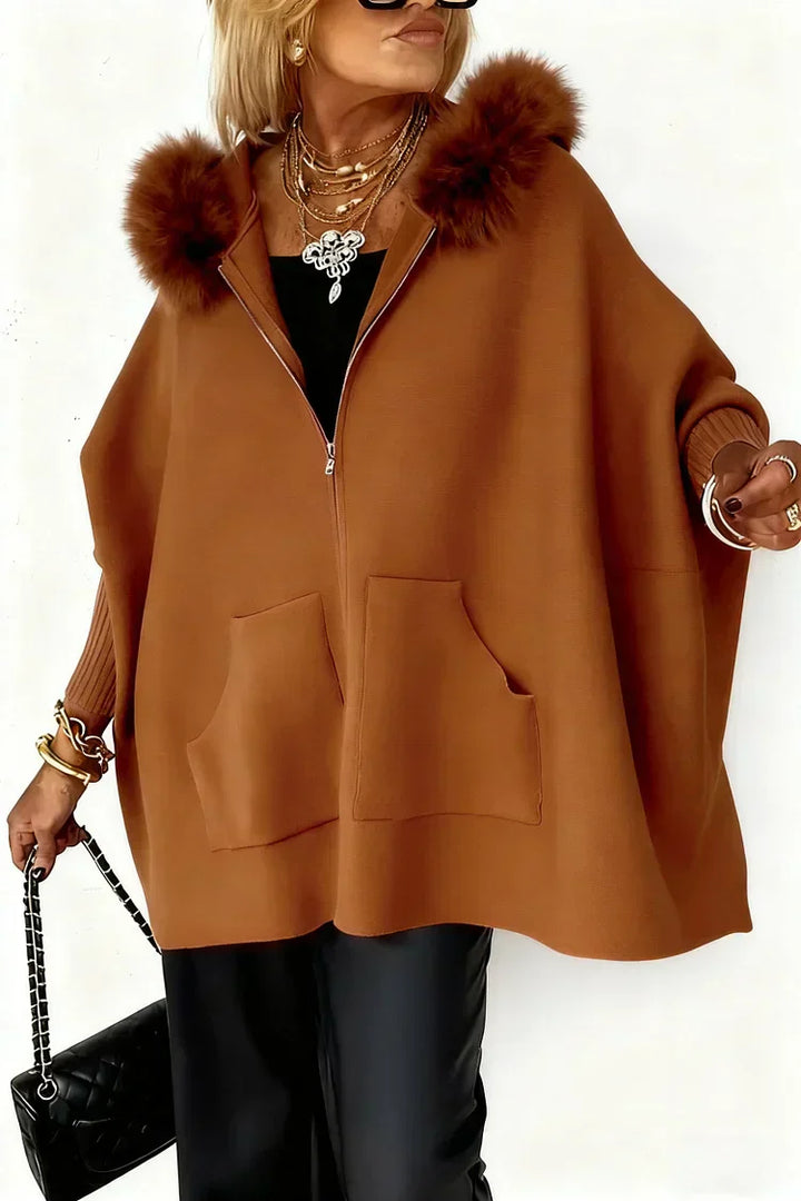 Trina | Women’s hooded poncho style jacket with soft trim and a relaxed drape