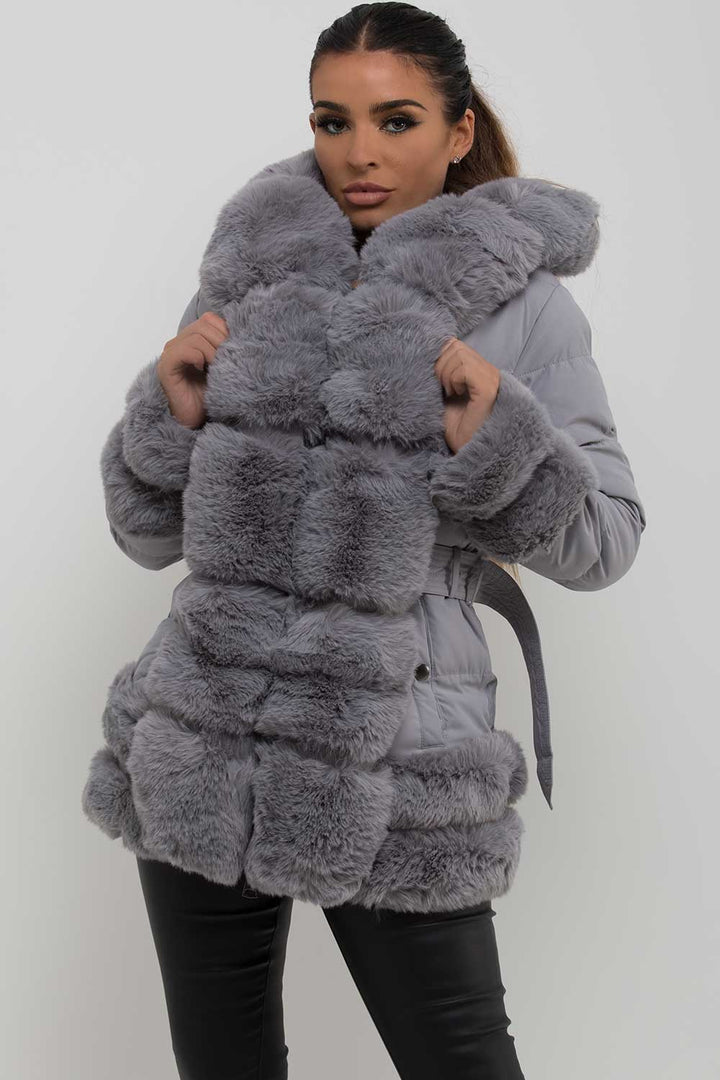 Kiana |  Women’s faux fur trim hooded puffer jacket with belt