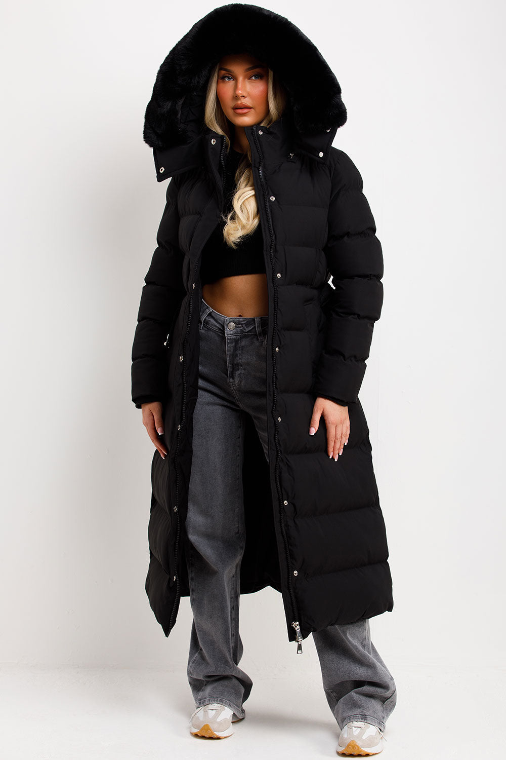 Reeva | Women’s long puffer coat with faux fur hood and belt