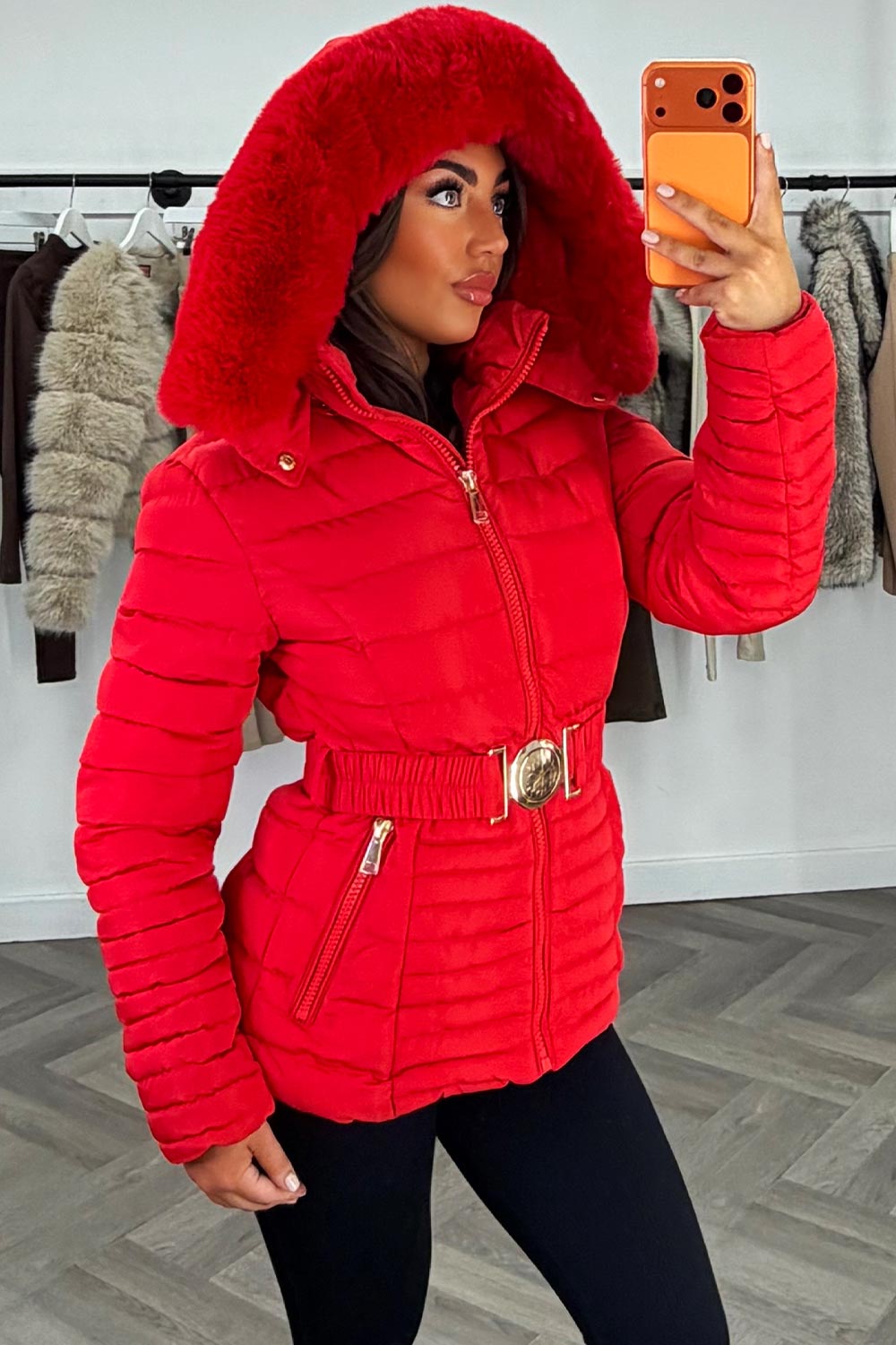 Eleanore | Women’s belted puffer jacket with faux fur hood