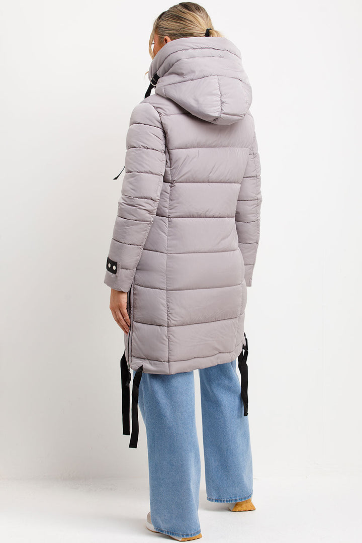 Bailee | Women’s long hooded puffer coat with side strap detail