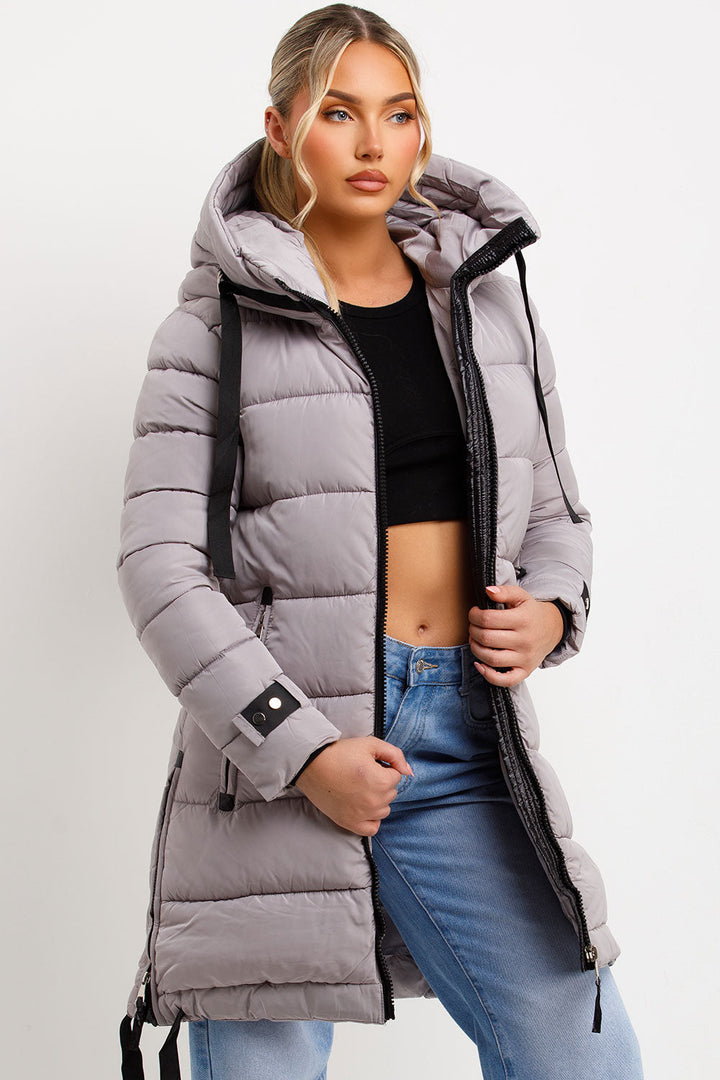 Bailee | Women’s long hooded puffer coat with side strap detail