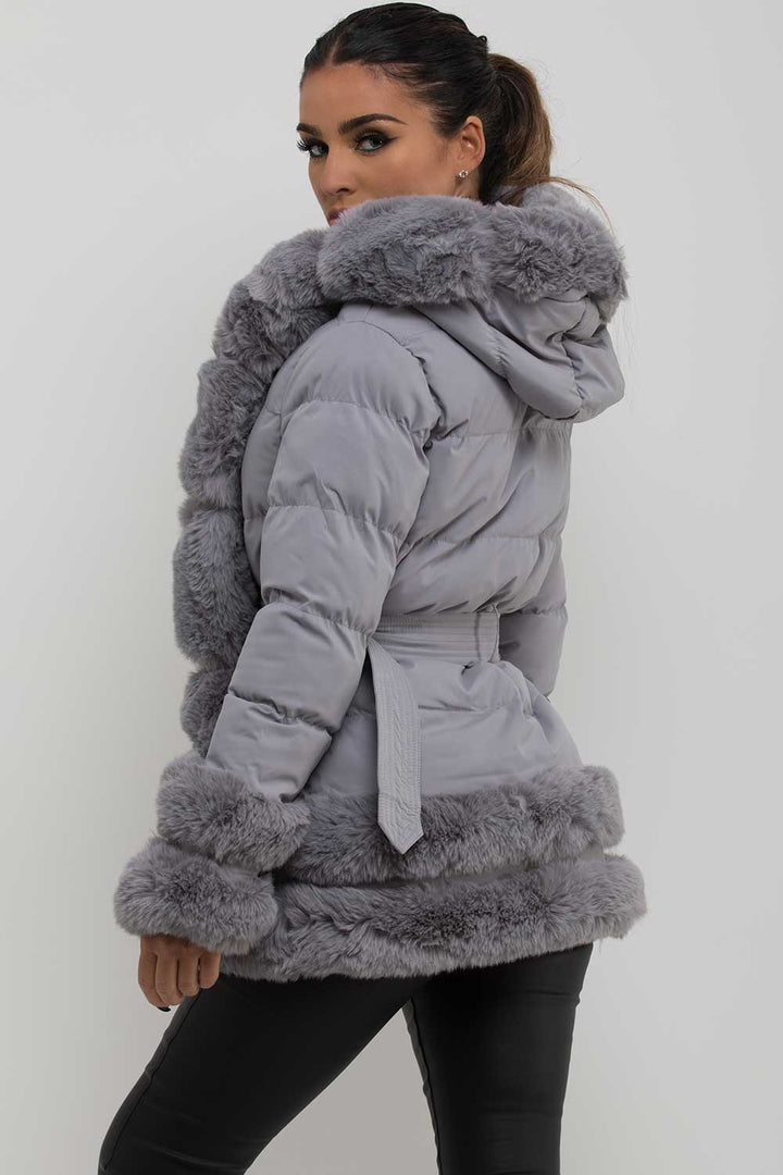 Kiana |  Women’s faux fur trim hooded puffer jacket with belt