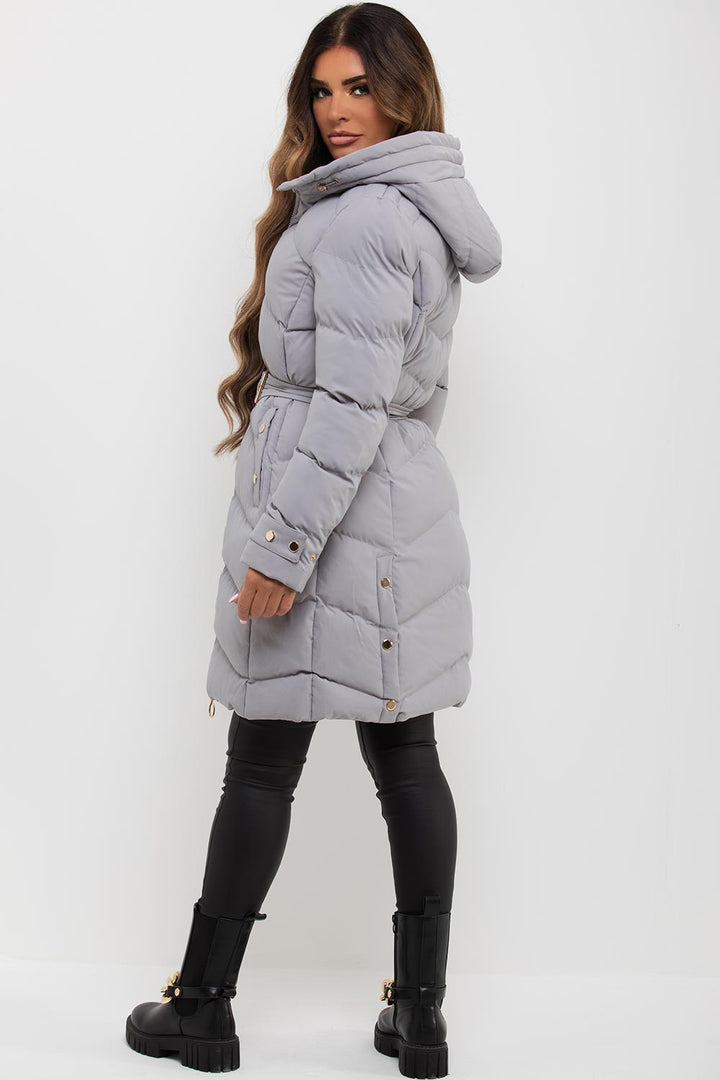 Lilia | Women’s long puffer coat with belt and hood
