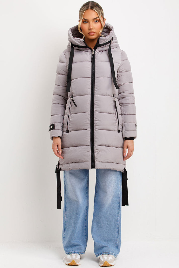 Bailee | Women’s long hooded puffer coat with side strap detail