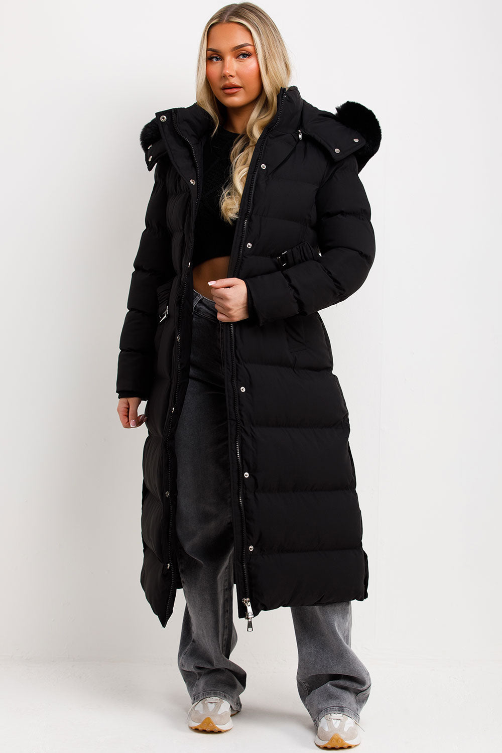 Reeva | Women’s long puffer coat with faux fur hood and belt
