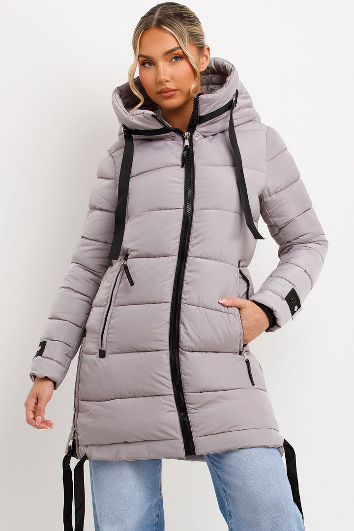 Bailee | Women’s long hooded puffer coat with side strap detail