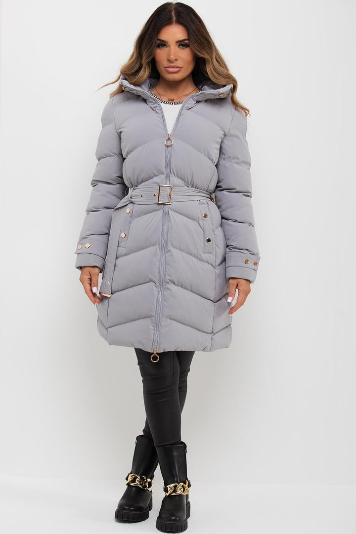 Lilia | Women’s long puffer coat with belt and hood