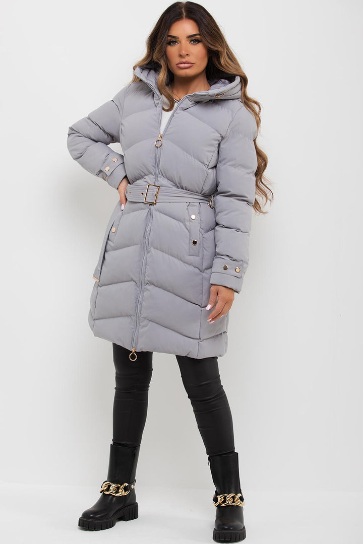 Lilia | Women’s long puffer coat with belt and hood