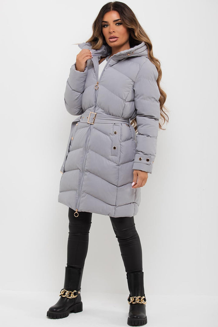 Lilia | Women’s long puffer coat with belt and hood