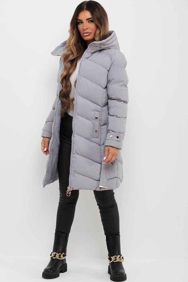 Lilia | Women’s long puffer coat with belt and hood