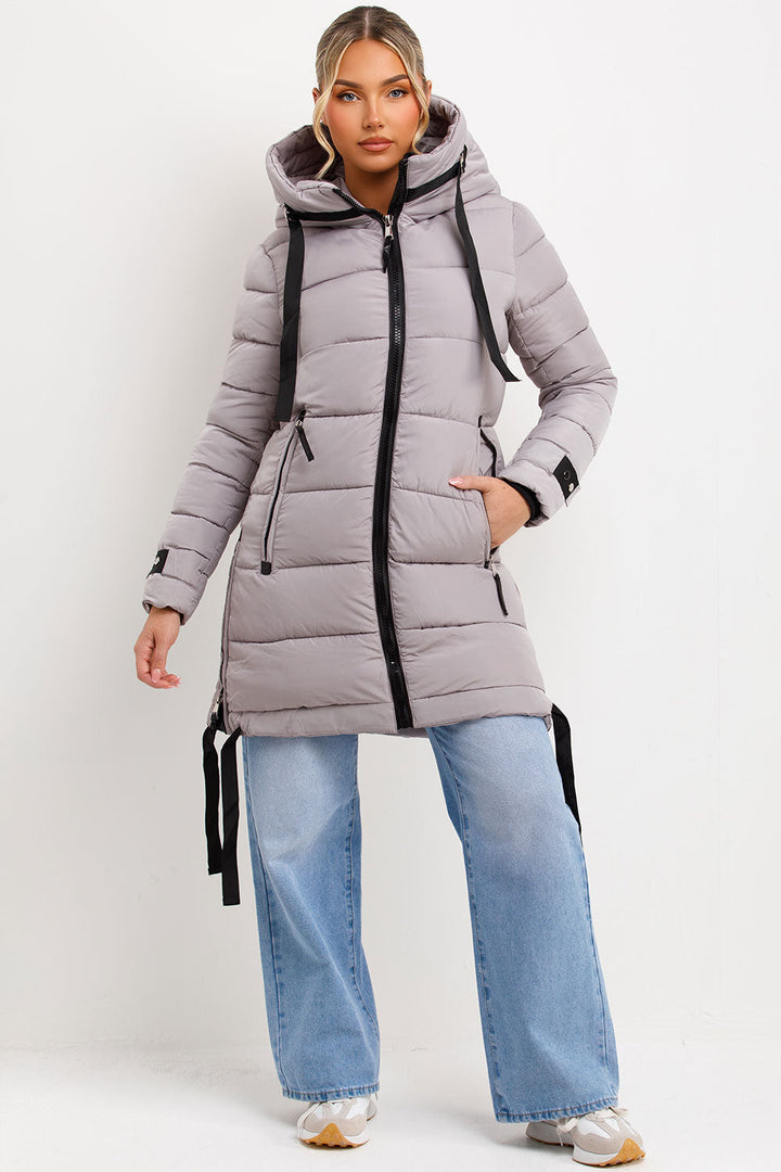 Bailee | Women’s long hooded puffer coat with side strap detail