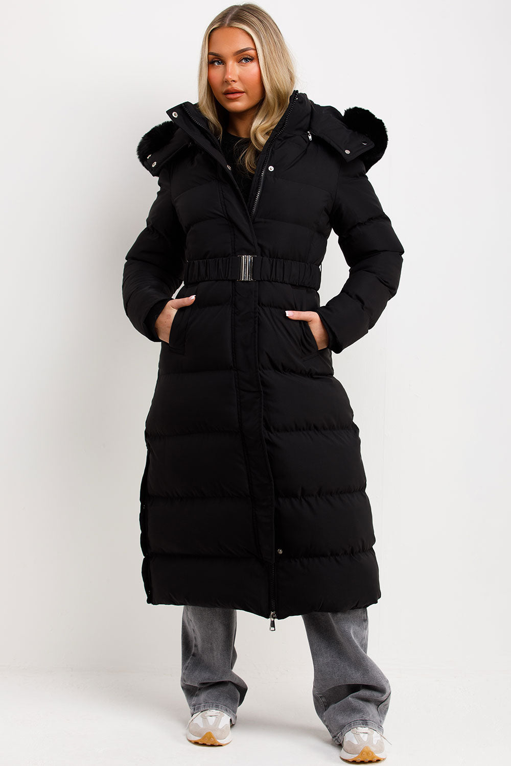 Reeva | Women’s long puffer coat with faux fur hood and belt