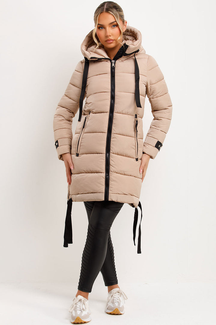 Joelle | Women’s long hooded puffer coat with side strap detail