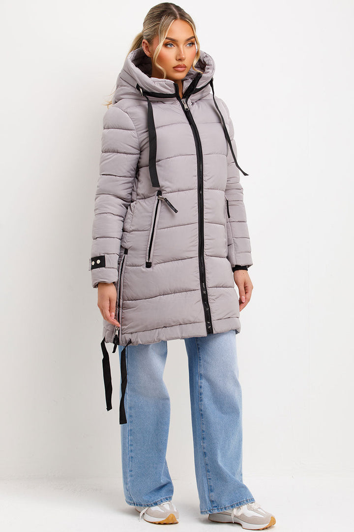 Bailee | Women’s long hooded puffer coat with side strap detail