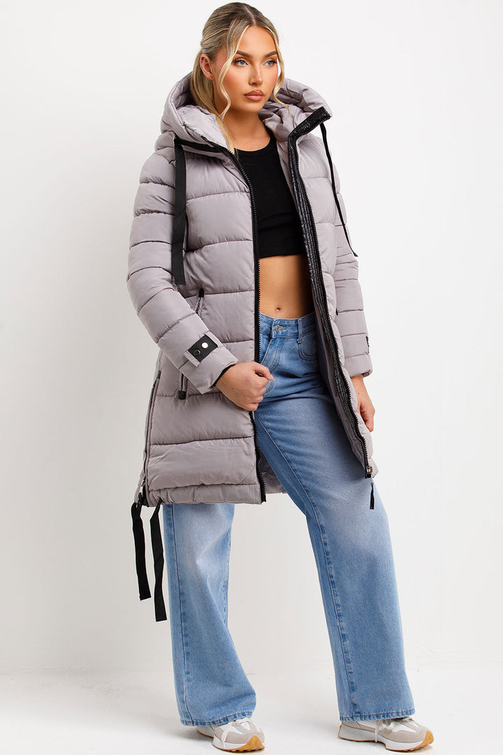 Bailee | Women’s long hooded puffer coat with side strap detail