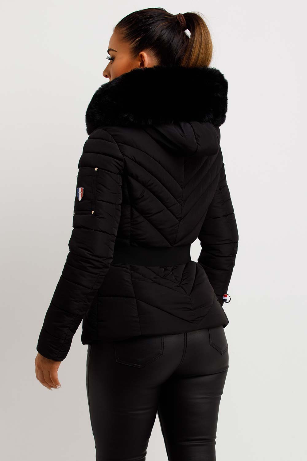 Dalia | Women’s belted puffer jacket with faux-fur hood
