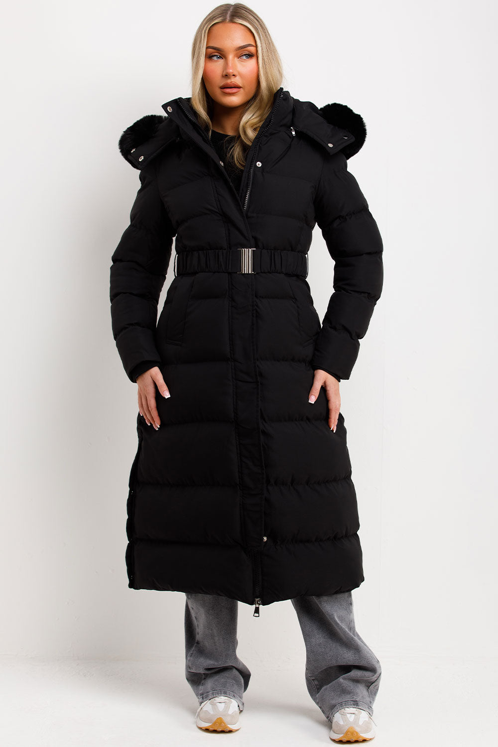 Reeva | Women’s long puffer coat with faux fur hood and belt