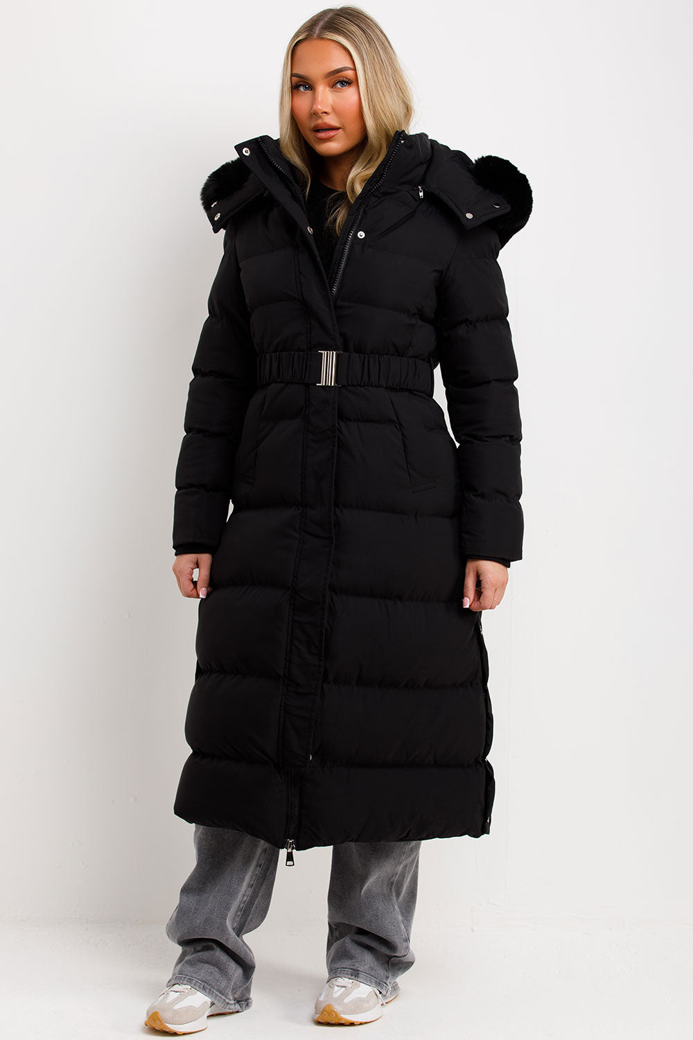 Reeva | Women’s long puffer coat with faux fur hood and belt
