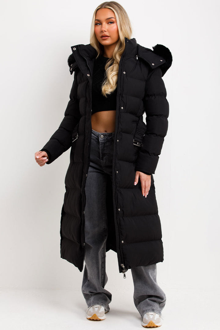 Reeva | Women’s long puffer coat with faux fur hood and belt